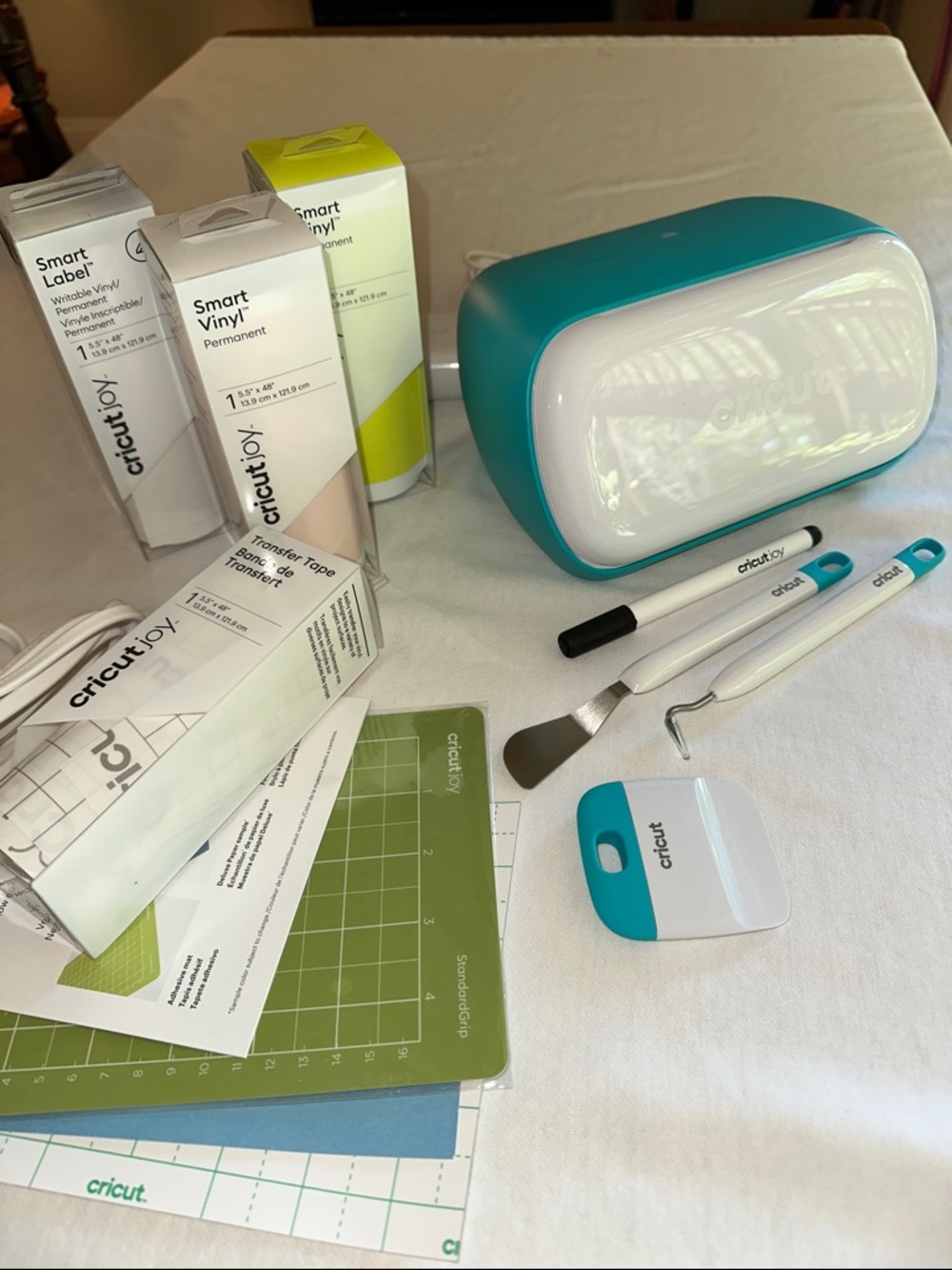 Cricut Joy mini with tools and Smart Vinyl